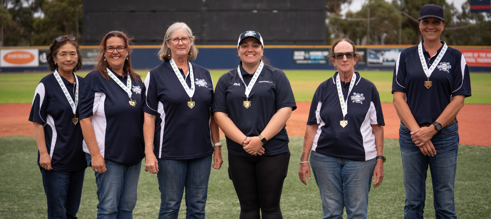 Group of women umpires officiating the Baseball Championships 
